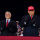 Former Donald Trump arrives for a campaign rally at Gerald R. Ford International Airport, Nov. 2, 2020, in Grand Rapids, Mich., with former Vice President Mike Pence.